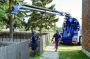Supreme Vac employees Ryan Dorchak, Dan Lin and Bryce Jeske set up at a job, with the company’s Foremost 1600 model hydroexcavator.