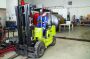 Matt Scott-Wade moves a forklift in the company’s shop in Lacombe, Alberta. 
