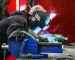 Lead welder Dustin Steegs uses welding equipment (Miller) while at the company shop in Lacombe, Alberta.
