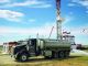 A crew from TKS Industries sits on a job site near Lacombe, Alberta. Crews will spend between 10 and 15 days on a single site. (Photos courtesy of TKS Industries)